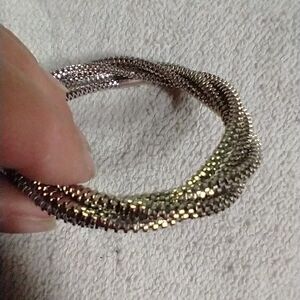 Silvertone multi layer textured bangle bracelet